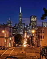 Photo:  Transamerica pyramid during blue hour seen from Montgomery Street